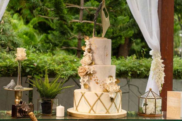 Three-tier ivory wedding cake